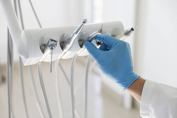 Professional Emergency Dentist technician working in Indian River, MI